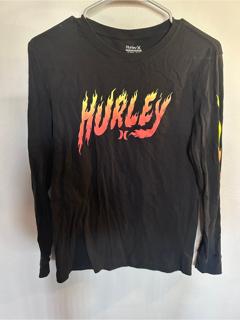 Hurley Black Tee with Yellow-Orange Flame Graphic